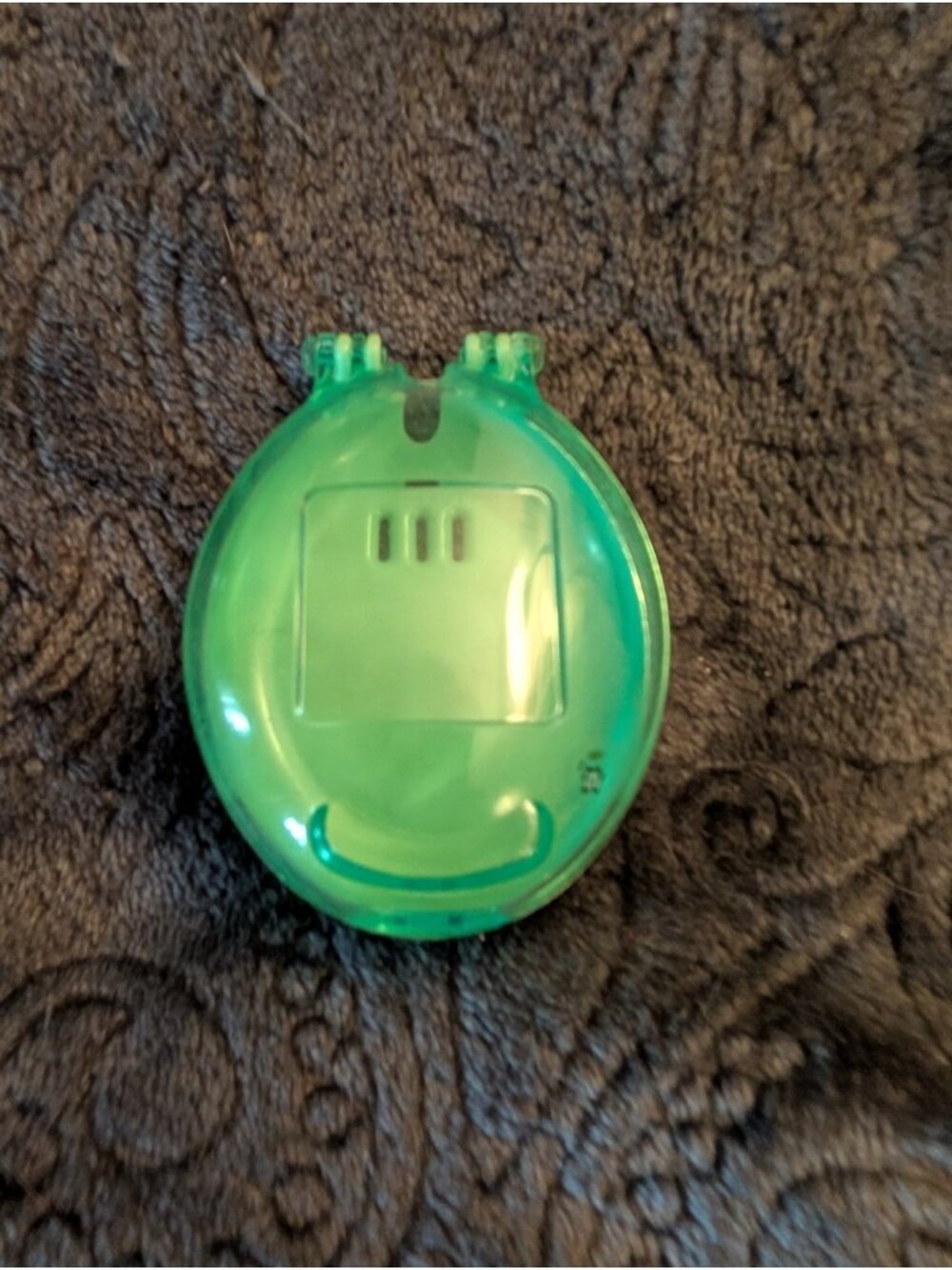 Bandai 1997 Official Tamagotchi New Species Clear Green Case
